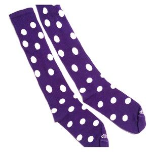 Purple and white polkadot volleyball socks.